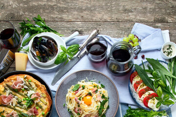 Italian cuisine on rustic wooden table