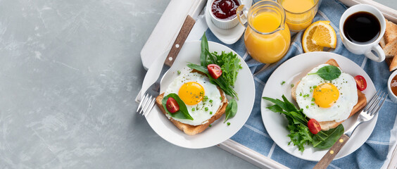 Traditional American breakfast on wooden tray