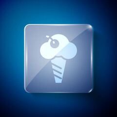 White Ice cream in waffle cone icon isolated on blue background. Sweet symbol. Square glass panels. Vector.