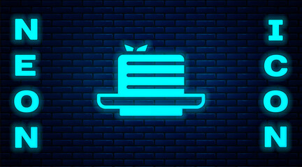 Glowing neon Medovik icon isolated on brick wall background. Honey layered cake or russian cake Medovik on plate. Vector.