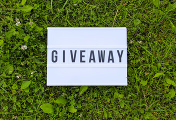 Giveaway word on the white display