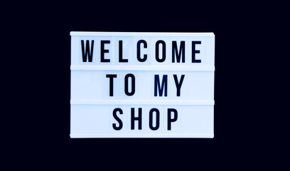 Welcome to my shop words on white display