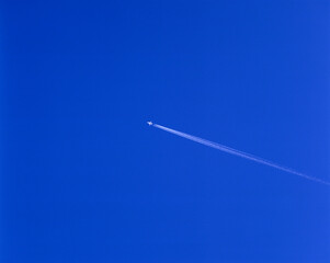 airplane in the blue sky