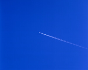 airplane in the blue sky