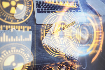 Tech theme hologram over woman's hands taking notes background. Concept of hightech. Double exposure