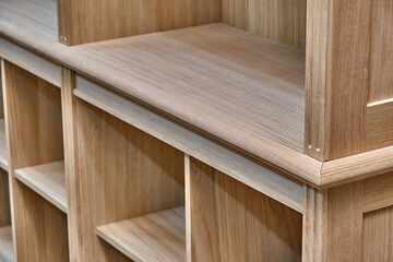 Naklejka na ściany i meble Modern joinery. Wooden bookcases in process of production in workshop. Furniture manufacture