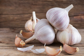 Fresh garlic on wooden background,copy space.