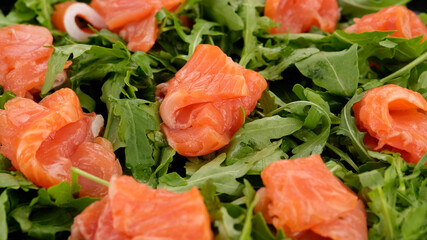 fresh sliced salmon and arugula salad 