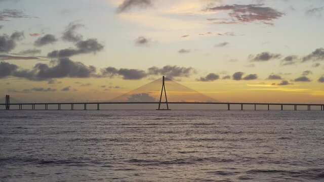 4K footage of Sunset at Bandra Worli sea link also known as Rajiv Gandhi Sea link From Window Glass Reflaction Mumbai, India 2020