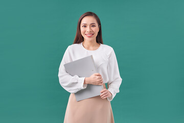 Happy successful business woman with gray folder