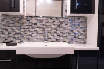 Modern mosaic tile bathroom splash back sink example