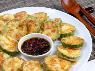 Korean food : Hobakjeon. Zucchini sliced, flour-coated, and pan-fried in egg batter.