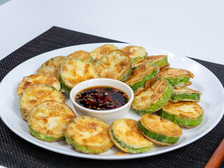 Korean food : Hobakjeon. Zucchini sliced, flour-coated, and pan-fried in egg batter.