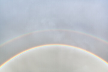 Double rainbow in the sky after rain