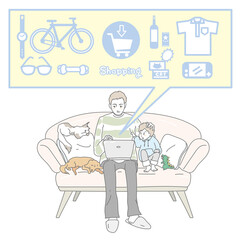 ソファーでネットショッピングをする父子
