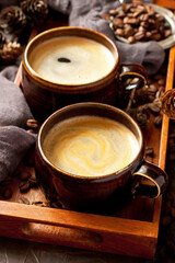 Coffee cup on  wooden tray