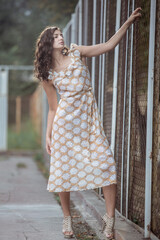 Fashionably dressed woman on the streets of a small Italian town