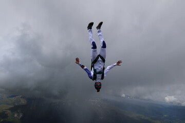 Fototapeta na wymiar Skydivers over mountains in Norway