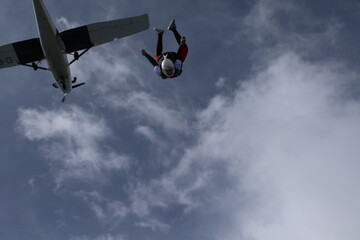 Naklejka na ściany i meble Skydivers over mountains in Norway