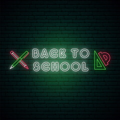 Fototapeta premium Back to School neon signboard. Bright glowing Back to School emblem on dark brick wall background. Stock vector illustration.