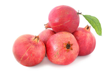 Several pomegranates with leaf isolated on white