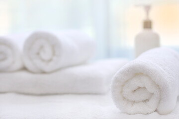Fototapeta na wymiar white towels on a towel