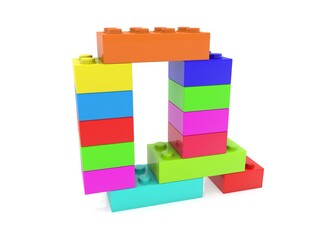 The letter Q is composed of toy bricks of different colors on white