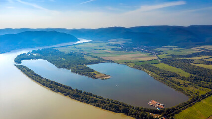Amazing aerial landscape photo about the Pilismarot bay in Danube bend Hungary. This place is a...
