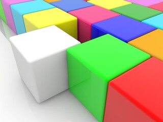 White toy block outside of colored toy blocks