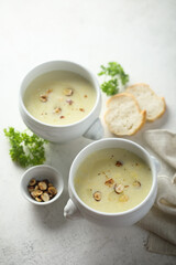 Homemade white asparagus soup with hazelnut