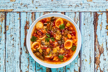 Minestrone, italian vegetable soup with pasta and beans.