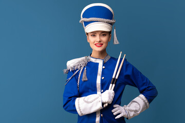 beautiful young woman from the orchestra. A drummer