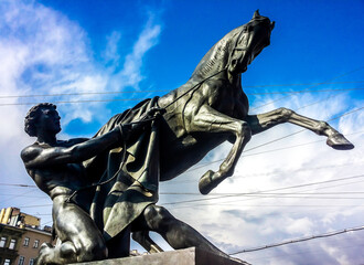 Sculpture tamer of horses on Anichkov bridge. St. Petersburg, Russia