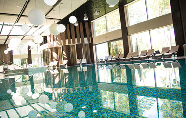 Luxury indoor swimming pool in a modern hotel. Spa and treatment