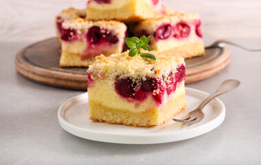 Cherry and coconut cheesecake, served