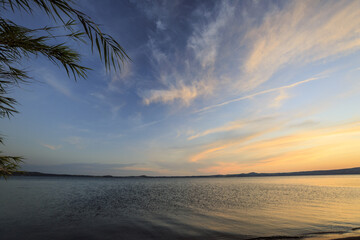 Sunrise at Lake Bolsena. between ducks and a landscape surrounded by nature