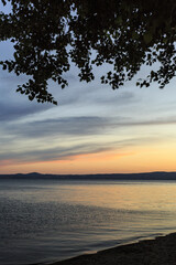 Fototapeta na wymiar Lake Bolsena at sunset. colors, nature and a spectacular landscape