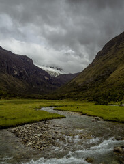 Fototapeta na wymiar River flowing into mountains in Huaraz, Peru