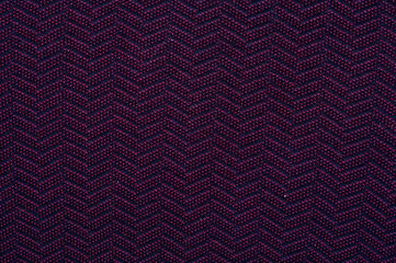 Close-up fragment of warm knitted purple hirts. Concept of warm everyday things. clothing store concept. Advertising space. Place for text