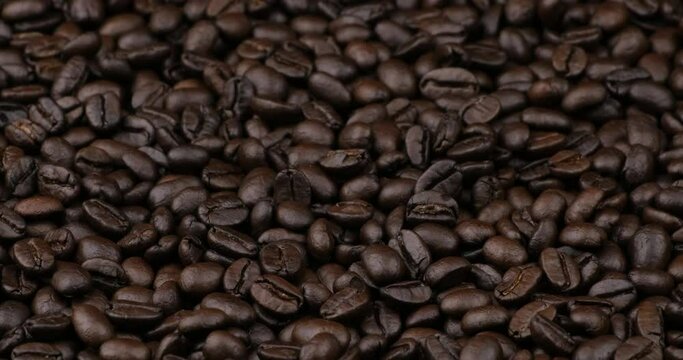 Truck shot of roasted coffee beans field for background texture pattern