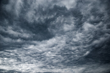 Dark storm clouds before the rain at day time.