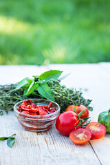 Sun-dried tomatoes and aromatic herbs