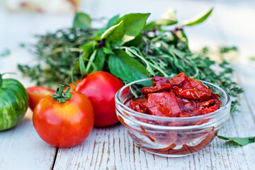 Sun-dried tomatoes and aromatic herbs