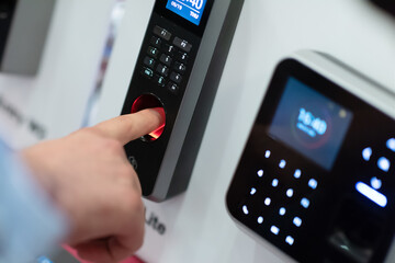 Fingerprint scan provides security access with biometrics identification. Business Technology...