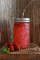 strawberry jam in a glass jar