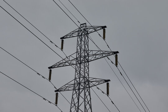 High voltage power lines conducting energy and power.