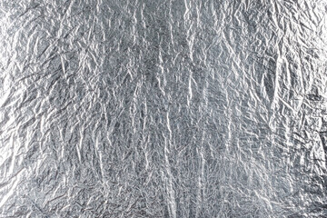 crumpled solid silver foil surface background