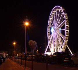 view from the road - ferris wheel at night