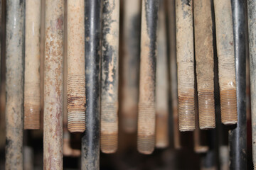 The mechanic is checking the engine.