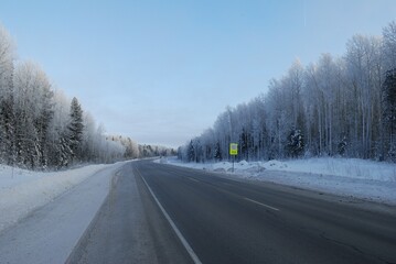 Khanty-Mansiysk. Western Siberia. Russia. January 20. 2011. Khanty - Mansiysk-Tyumen highway on a Sunny winter day.